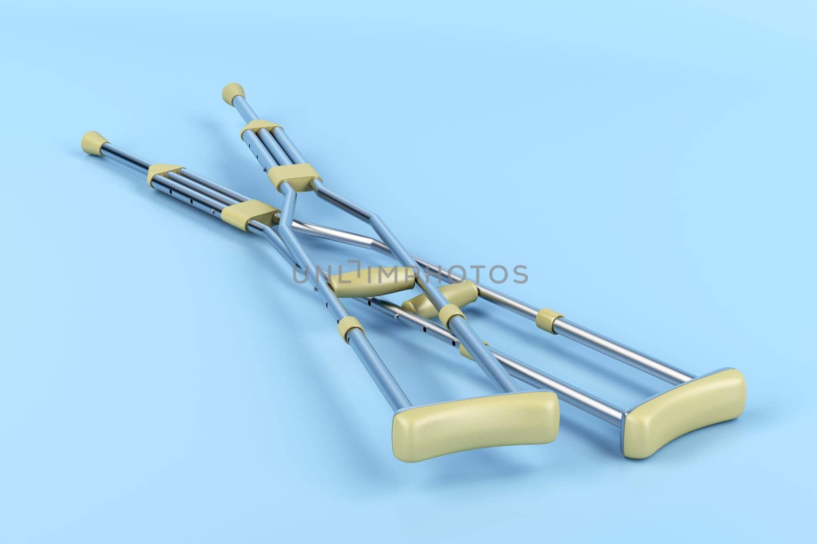 Pair of underarm crutches on blue background