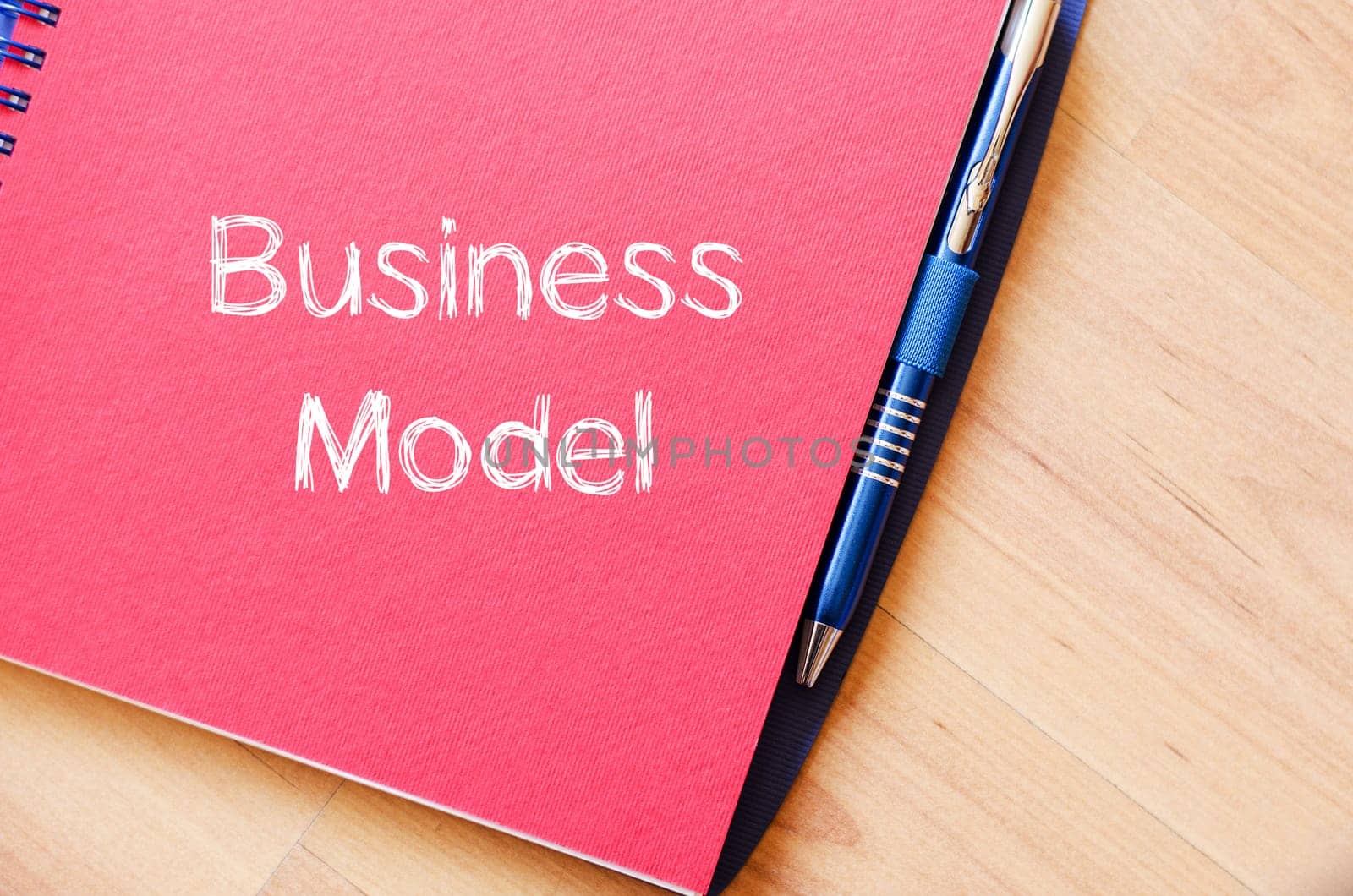 Business model text concept write on notebook