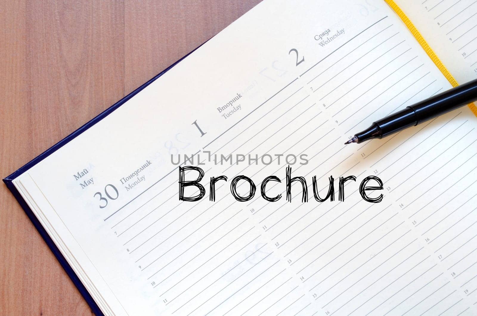 Brochure text concept write on notebook