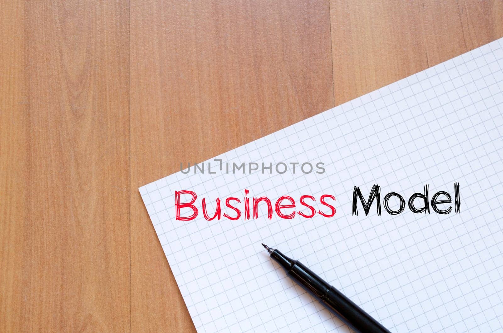 Business model text concept write on notebook