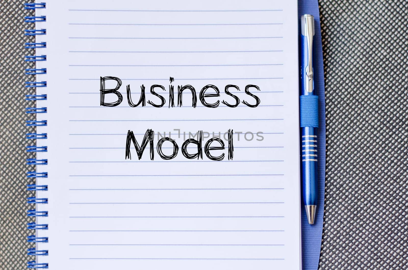 Business model text concept write on notebook