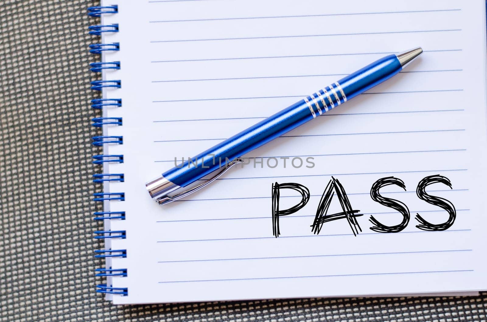 Pass text concept write on notebook