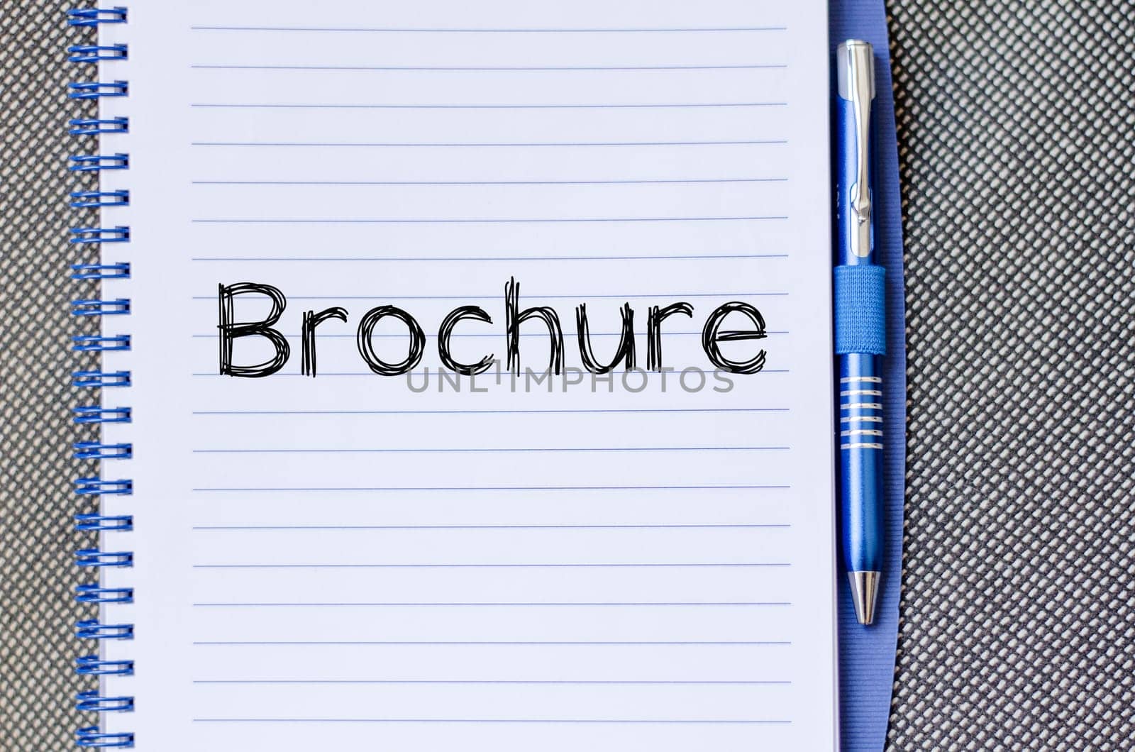 Brochure text concept write on notebook