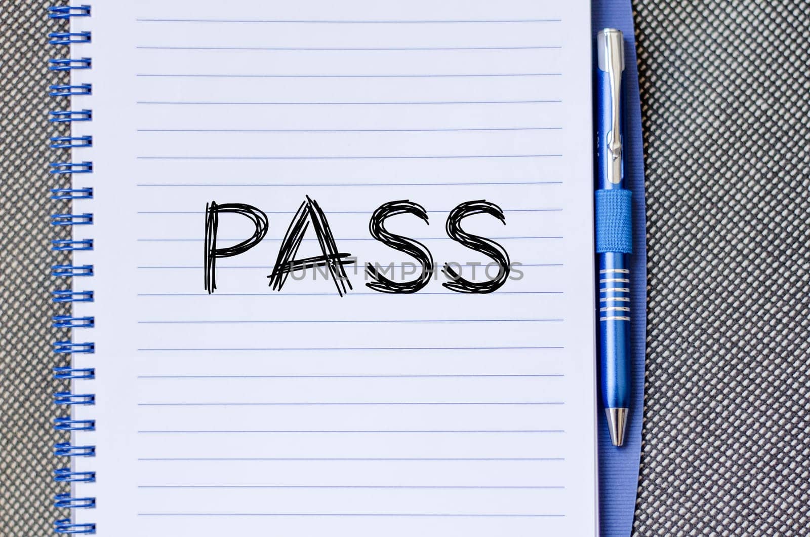 Pass text concept write on notebook