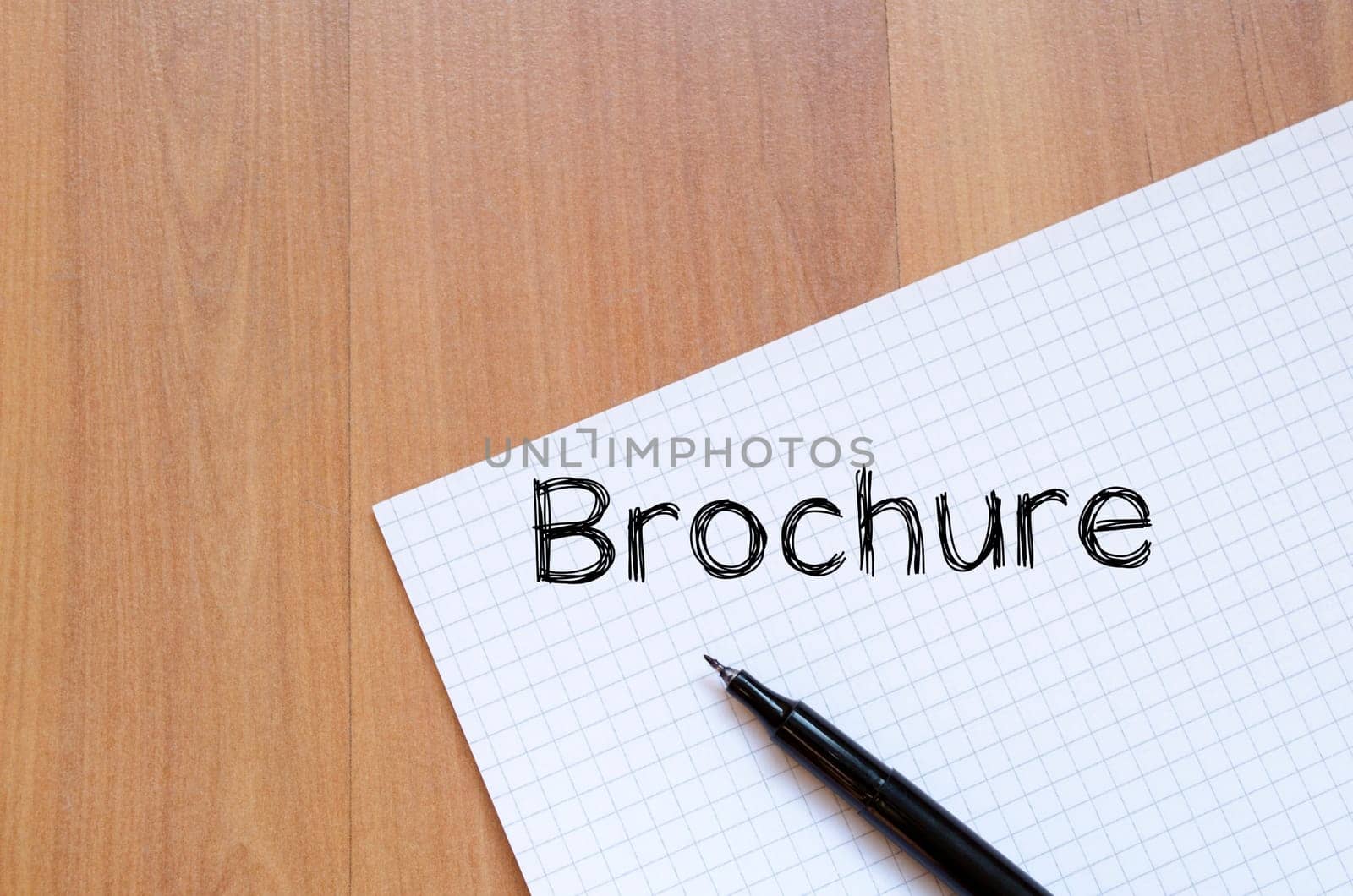 Brochure text concept write on notebook