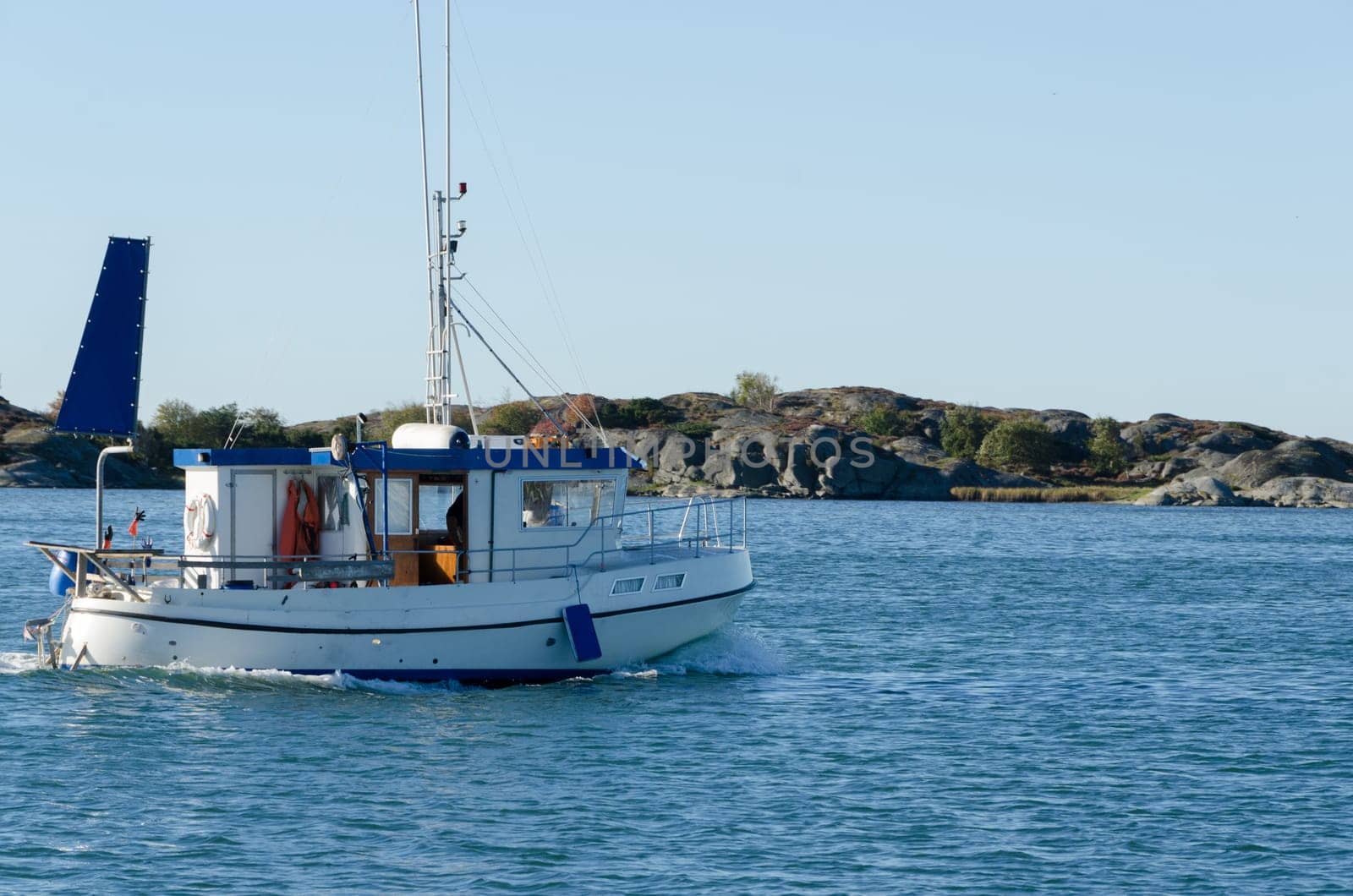 one small fishingboat on the swedish westcoast going out and fish