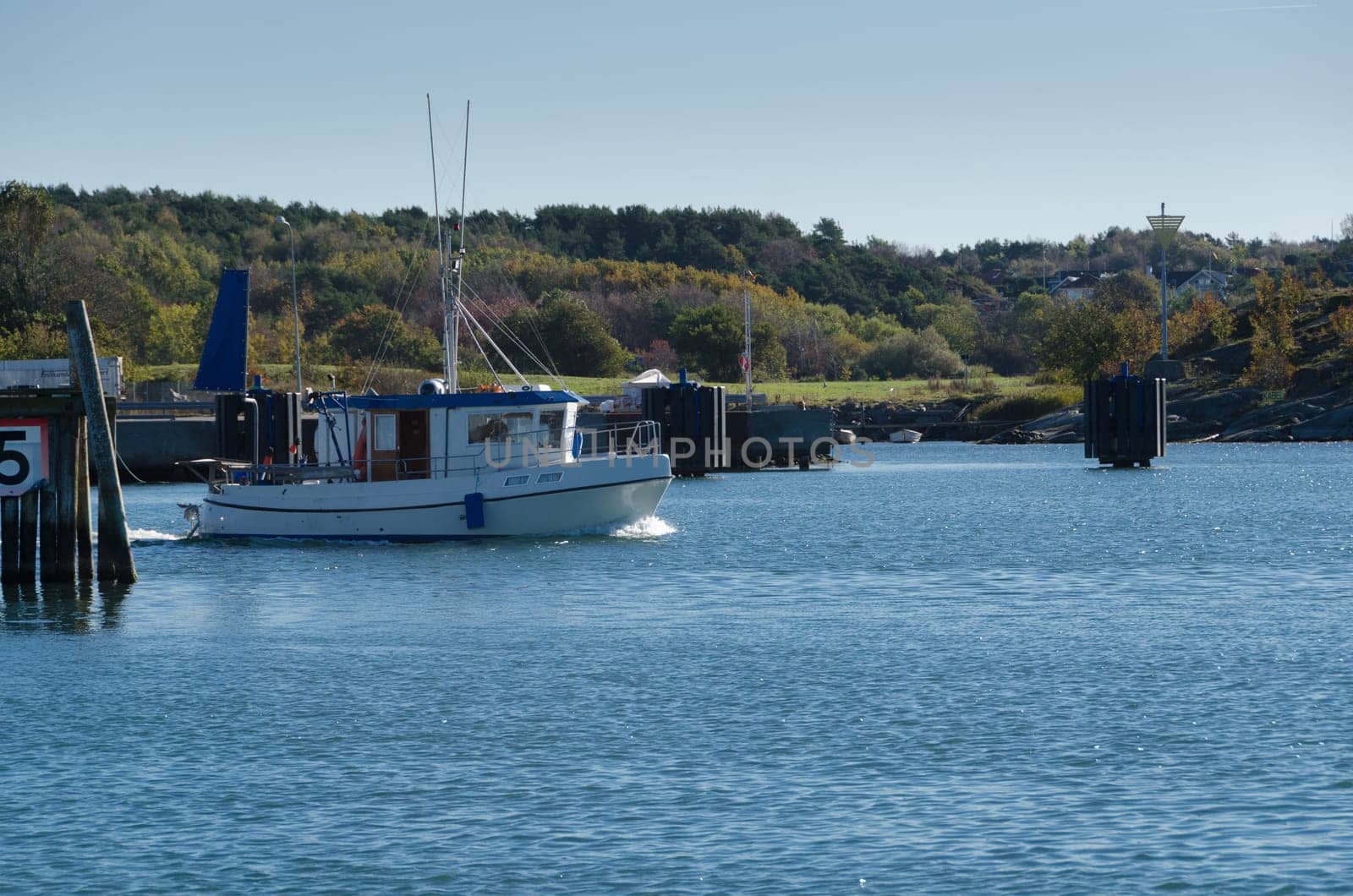 one small fishingboat on the swedish westcoast going out and fish