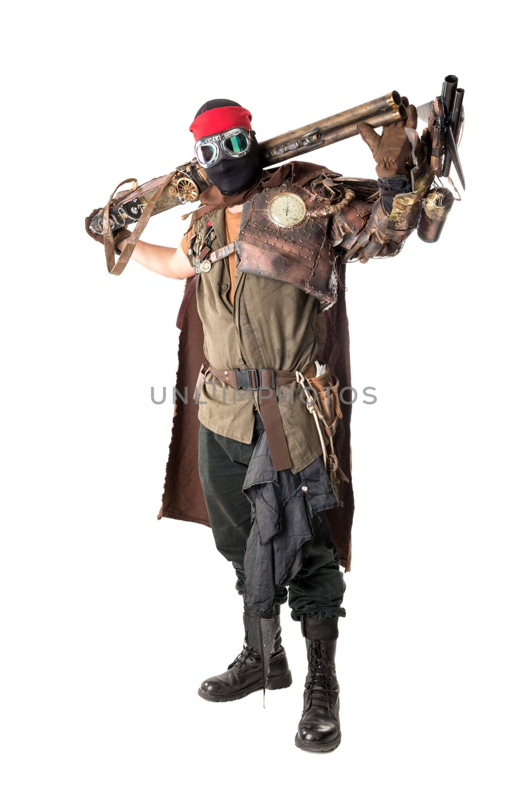 Futuristic soldier posing with gun and armor isolated in white