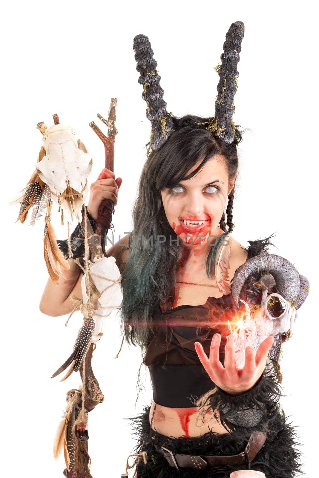 Faun sorceress with big horns and blood isolated in white