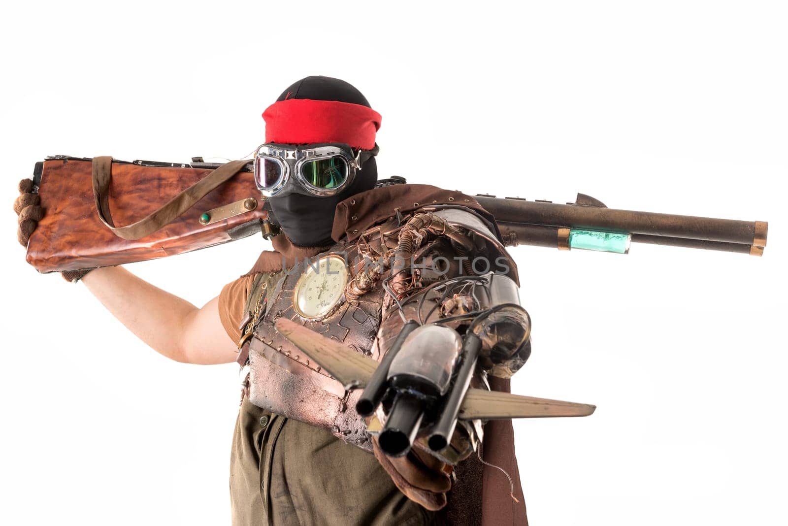 Futuristic soldier posing with gun and armor isolated in white