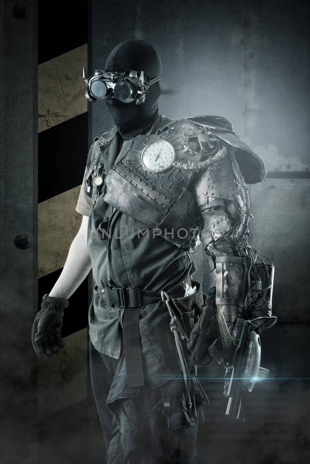Futuristic soldier posing with gun and armor