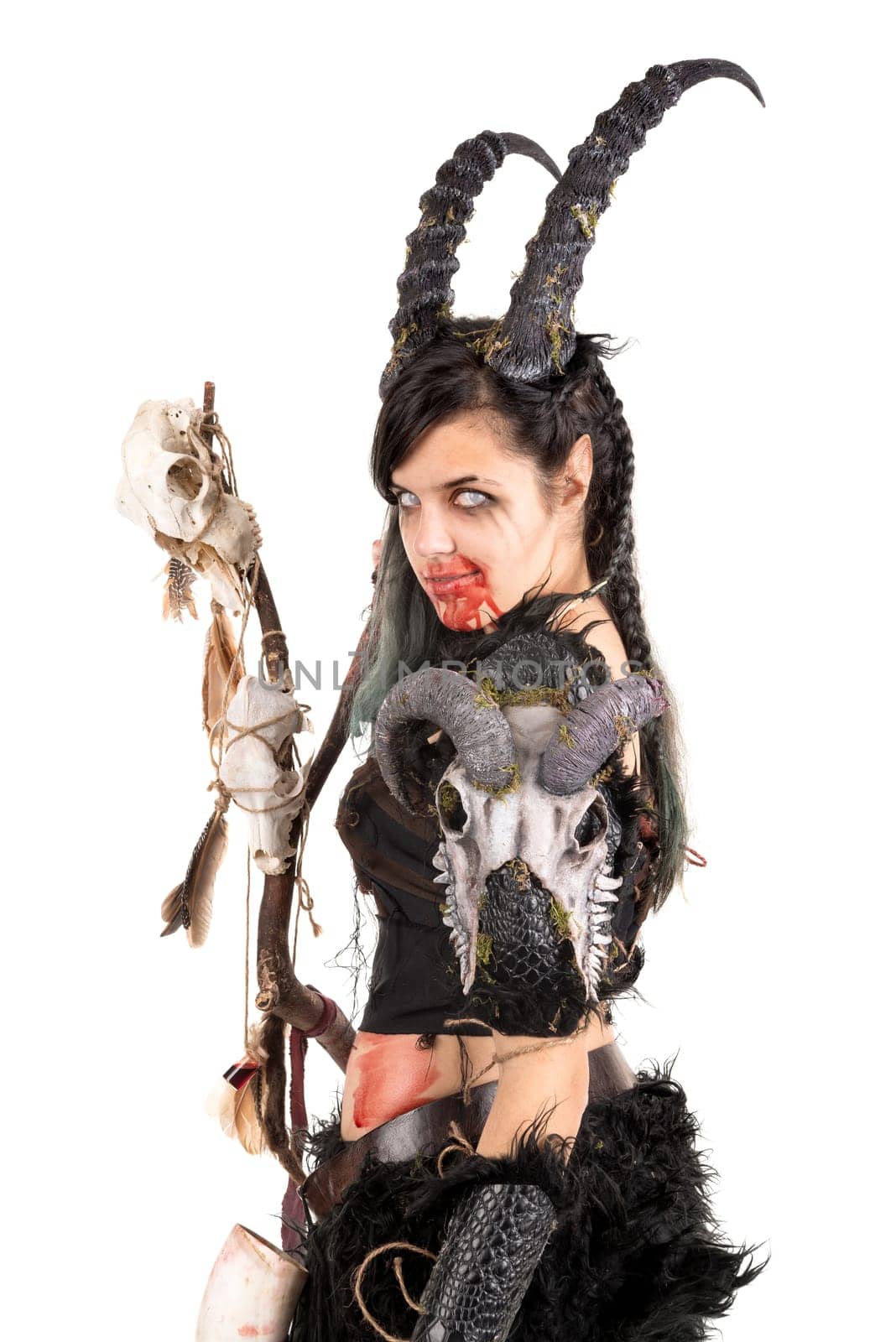 Faun sorceress with big horns and blood isolated in white