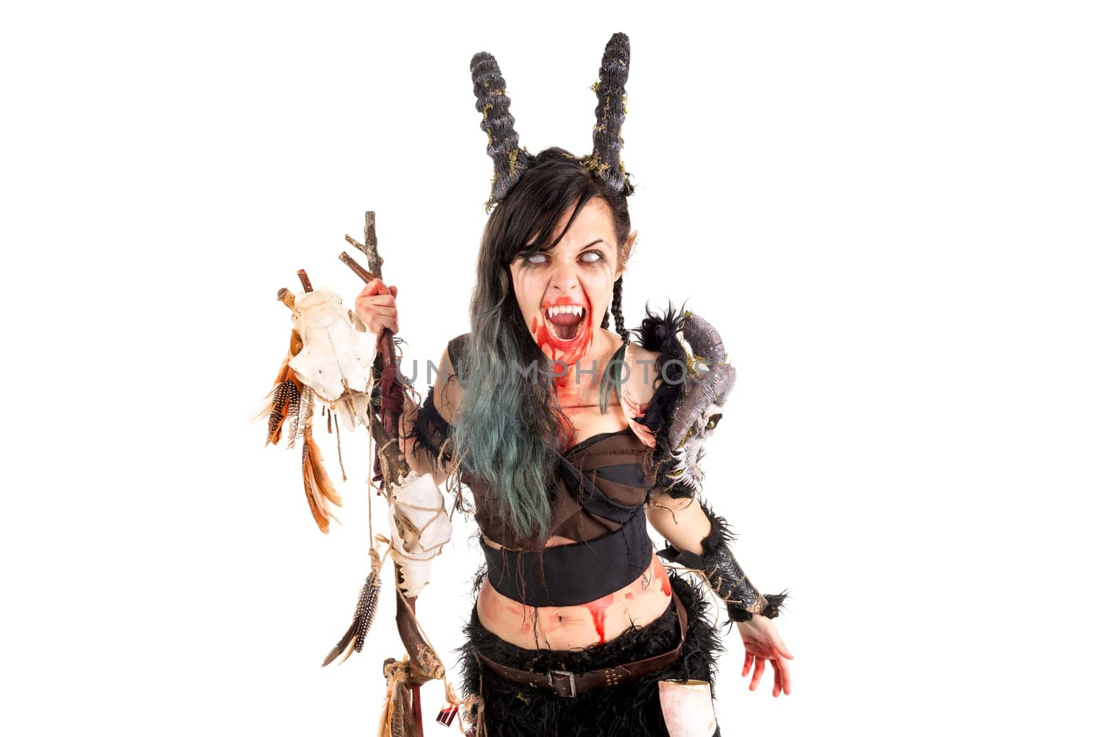 Faun sorceress with big horns and blood isolated in white