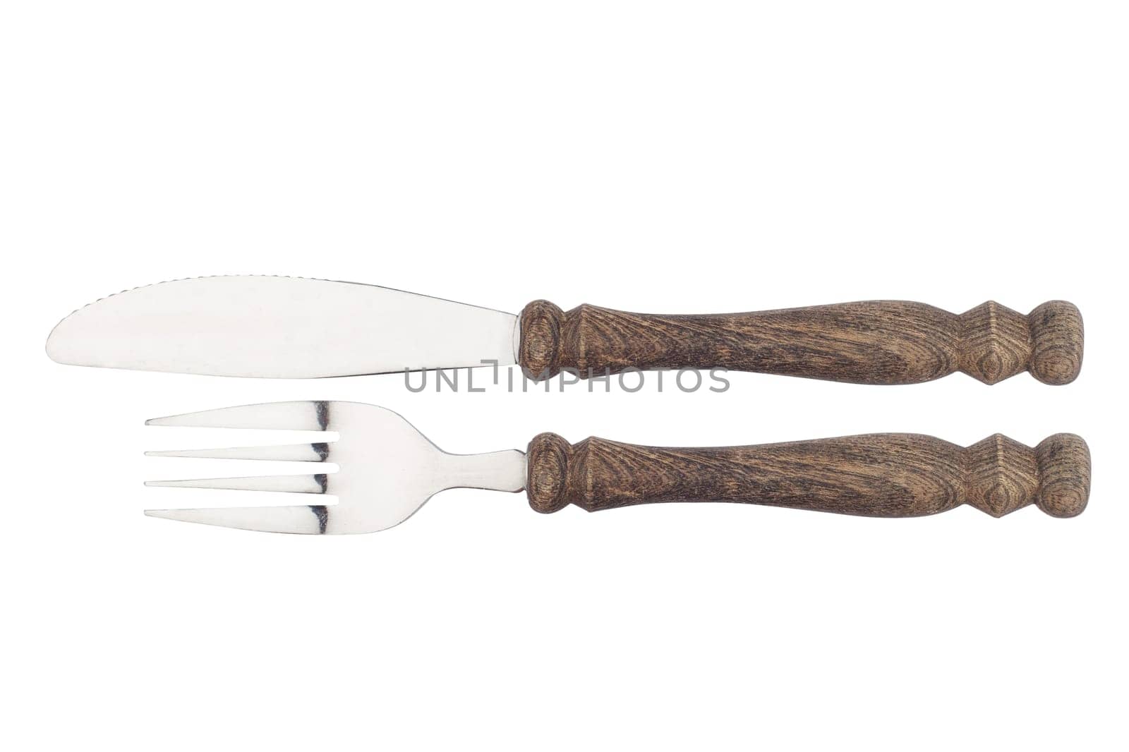 top view of knife and fork with wooden handles isolated on white