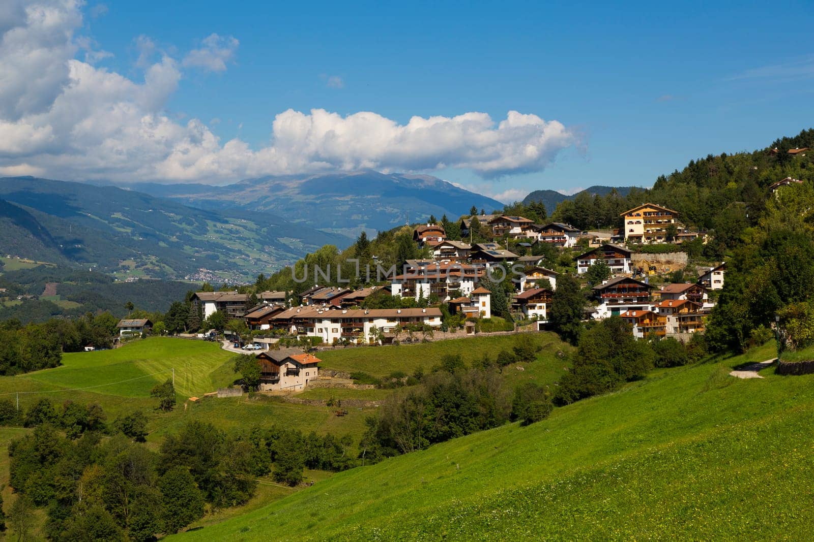 Panoramic view of the of Vols Am Schlern in a sunny day with clouds in the sky