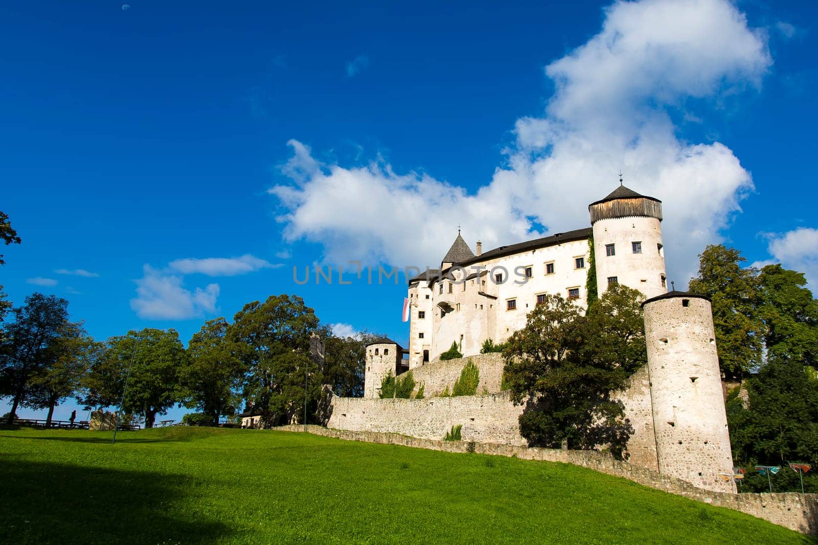 Vols Am Schlern, IT- September 22. View of castle of Presule in a sunny day with green grass and blue sky