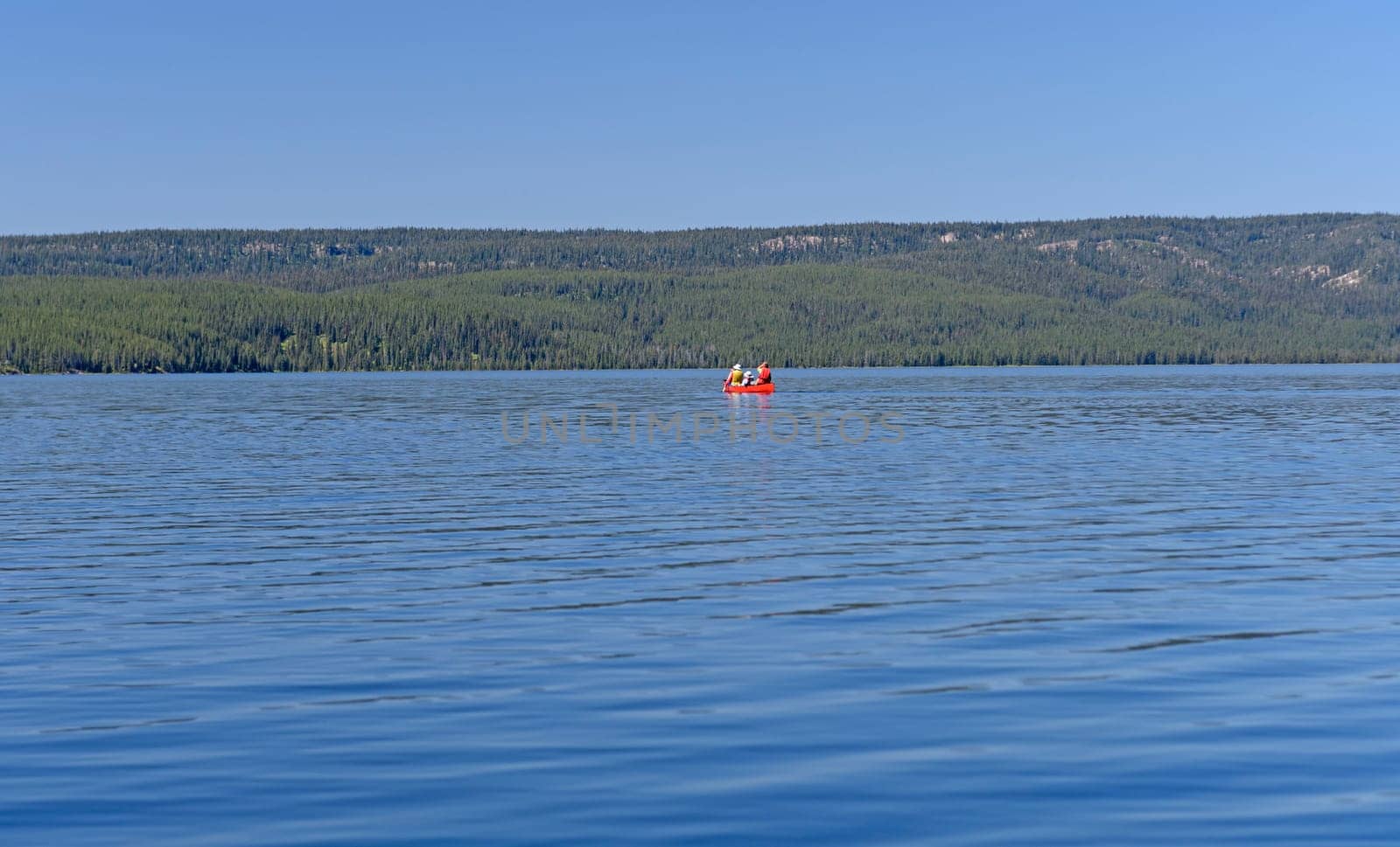 Canoeing on a Shoshone Lake in Yellowstone National Park in Wyoming