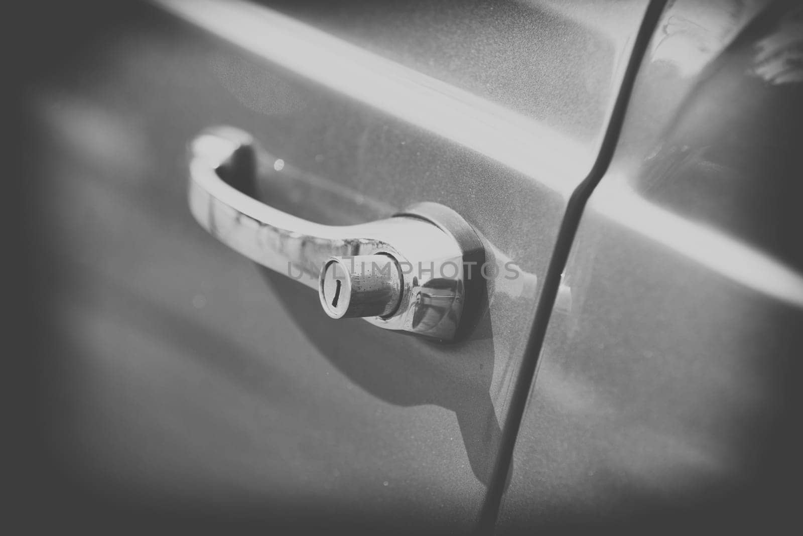 close up on old vintage car handle,black and white