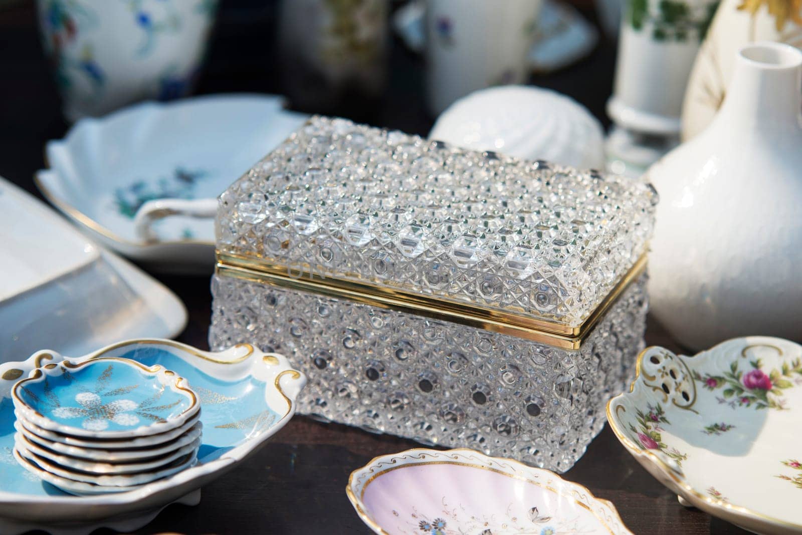 luxory chest and porelain plates on table