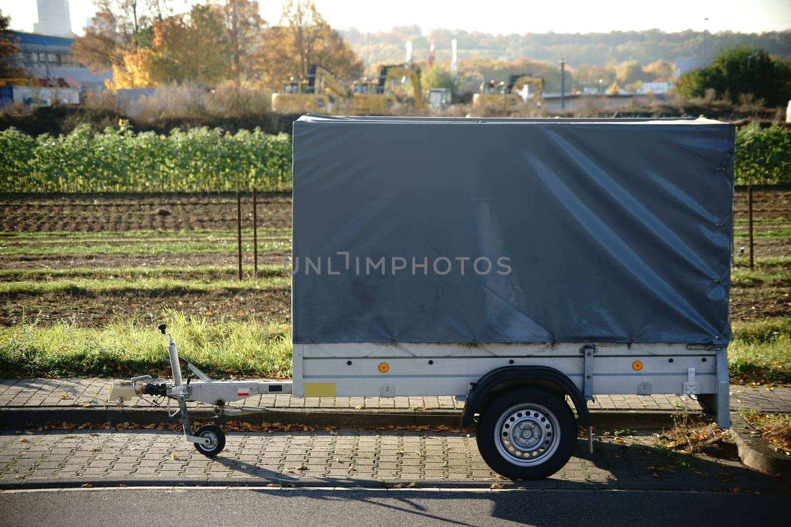 A car trailer for transporting small objects,tools and materials.