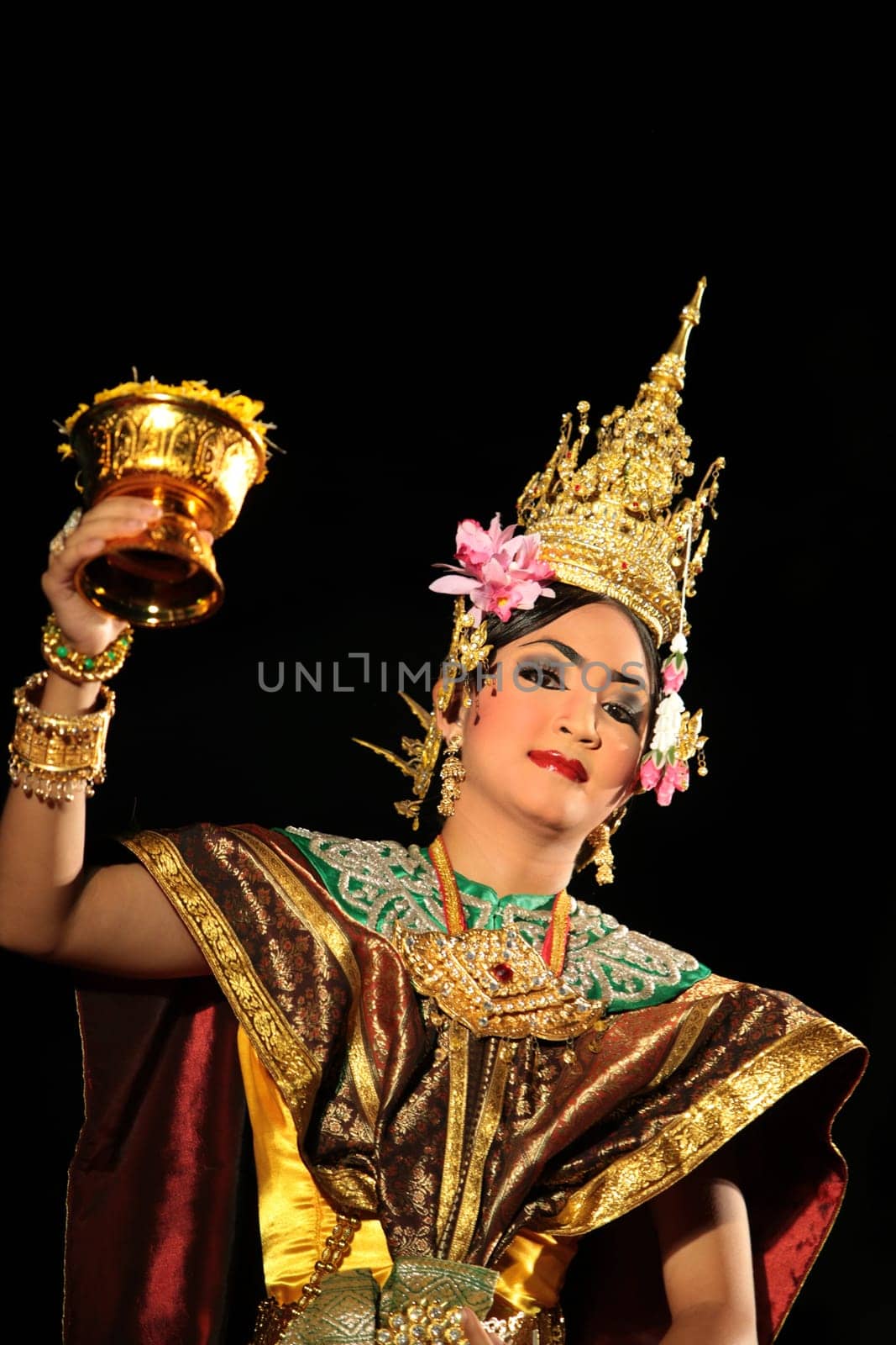 Traditional dancers dance in a park in Chiang Mai in northern Thailand.