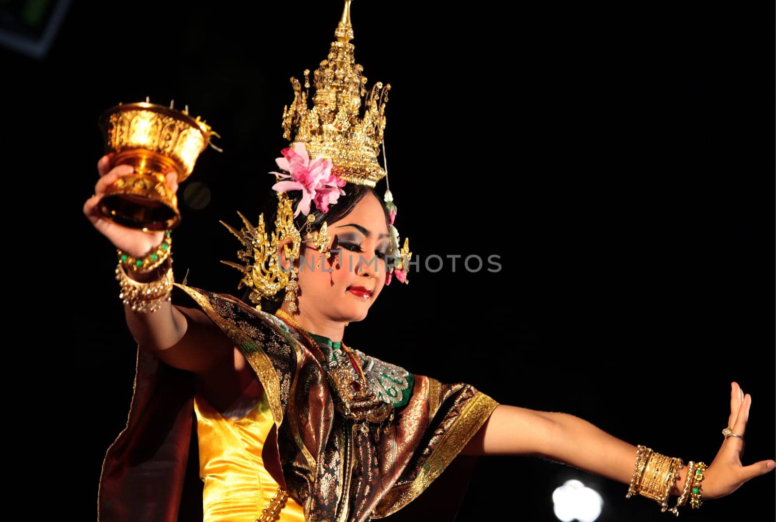 a traditional dance group in a park in the city of chiang mai in the north of Thailand in Southeastasia. ...