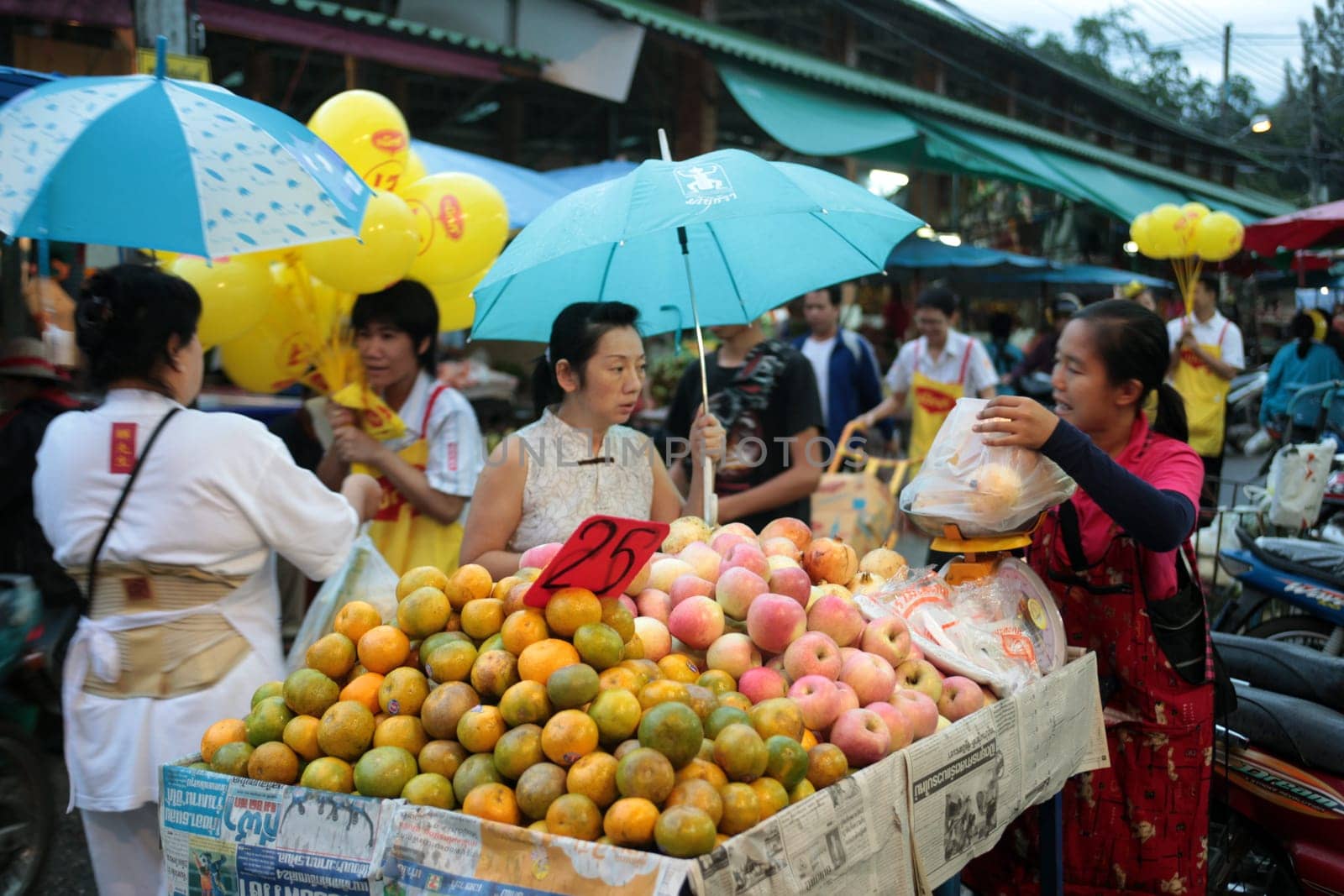 People at the Talat Warorot in the city of chiang mai in the north of Thailand in Southeastasia. ...