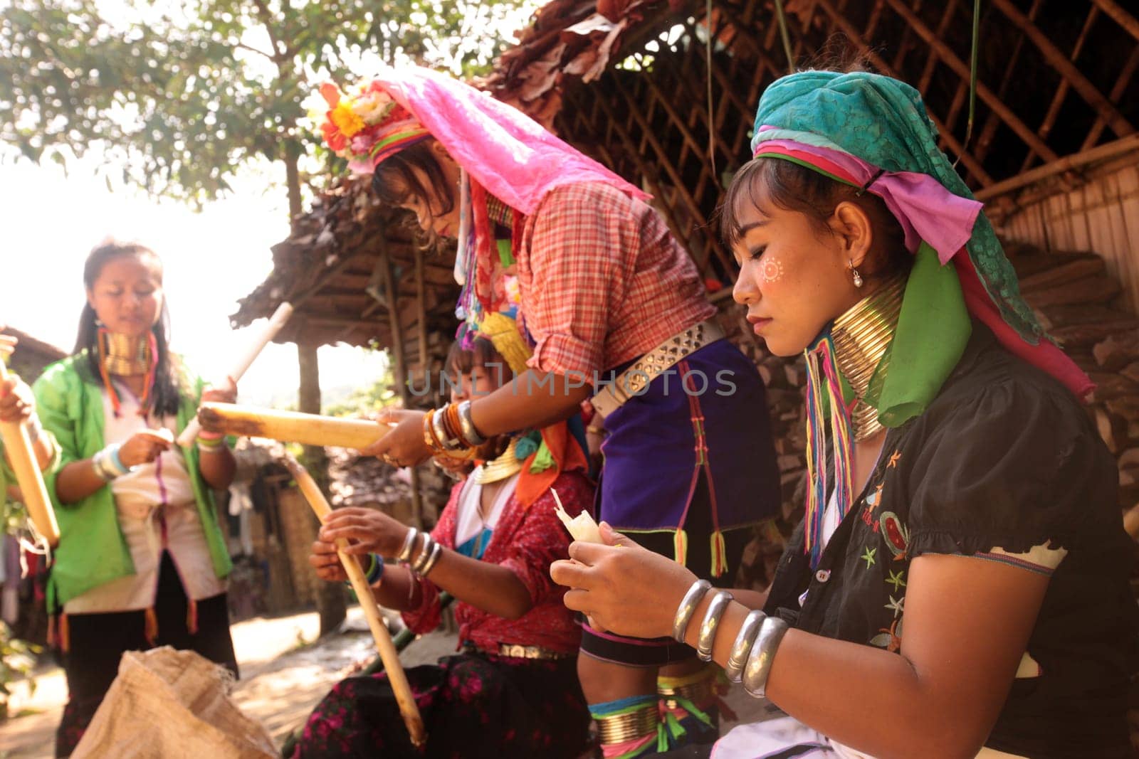 a traditional longneck women of the Paudang minority from Burma in a village north of chiang mai in the north of Thailand in Southeastasia. ...