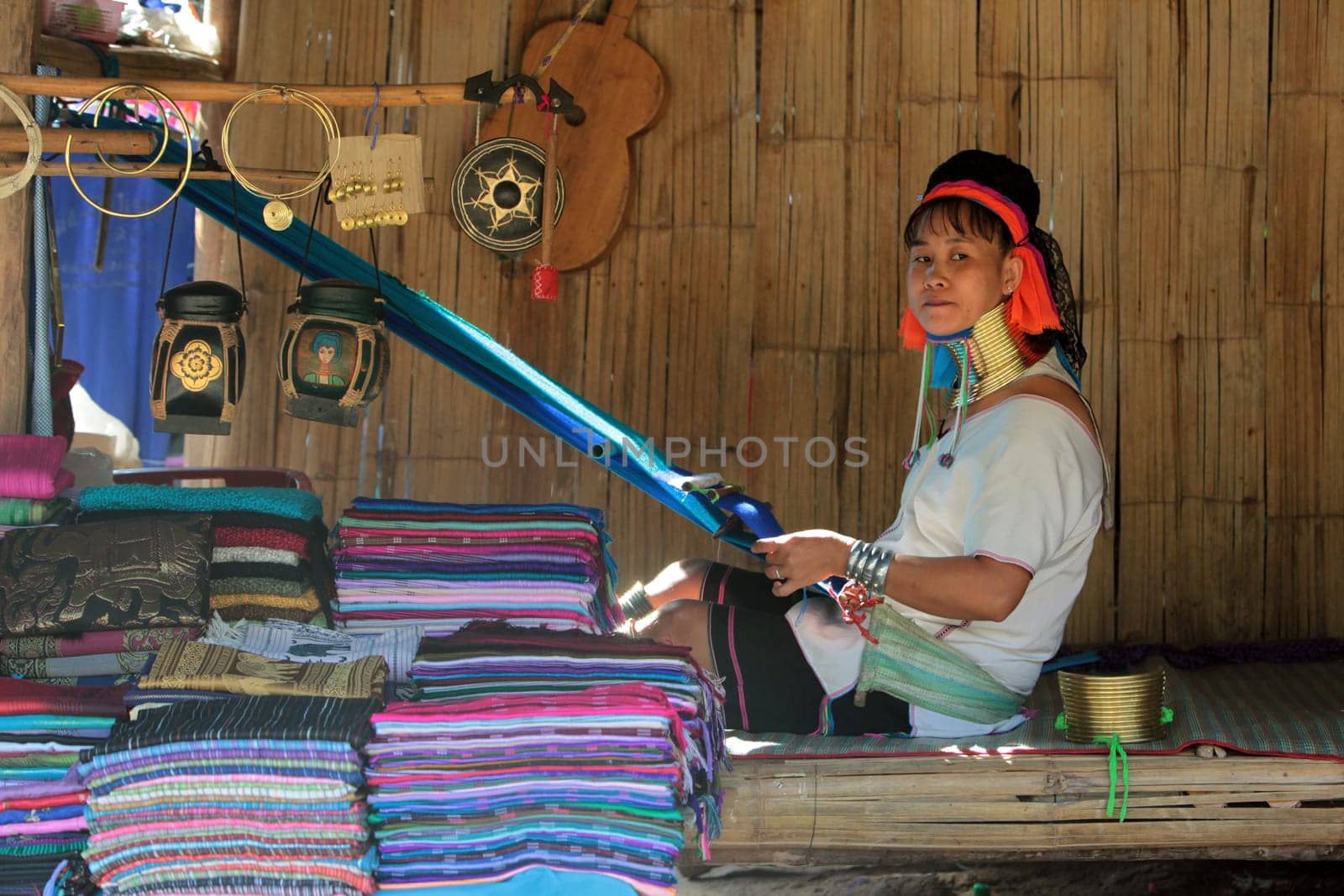 a traditional longneck women of the Paudang minority from Burma in a village north of chiang mai in the north of Thailand in Southeastasia. ...
