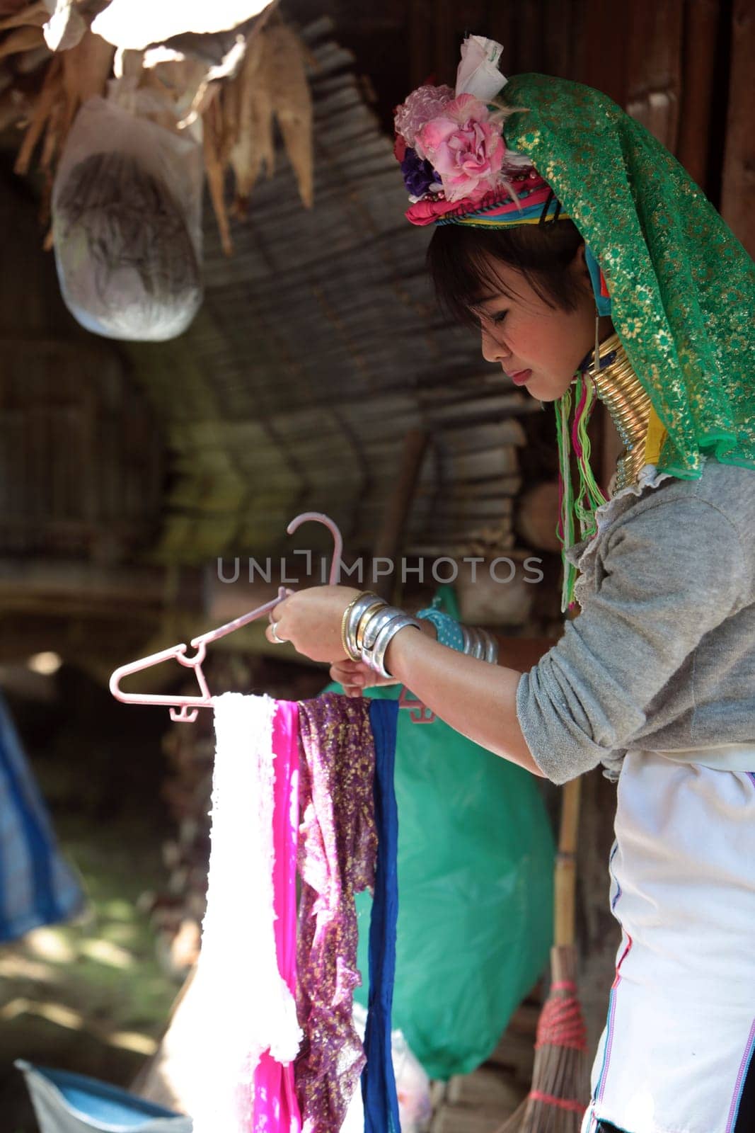 a traditional longneck women of the Paudang minority from Burma in a village north of chiang mai in the north of Thailand in Southeastasia. ...