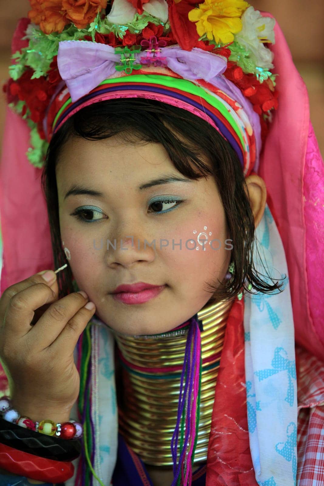 a traditional longneck women of the Paudang minority from Burma in a village north of chiang mai in the north of Thailand in Southeastasia. ...