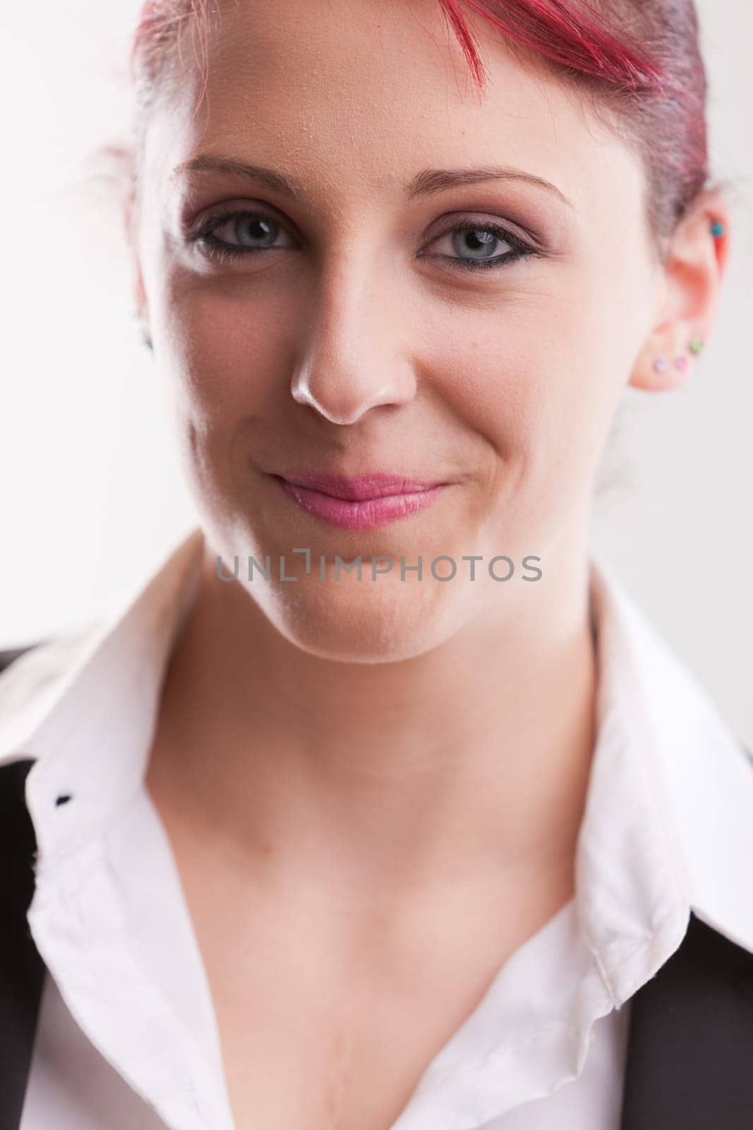 beautiful redhaired office girl worker smiling or laughing