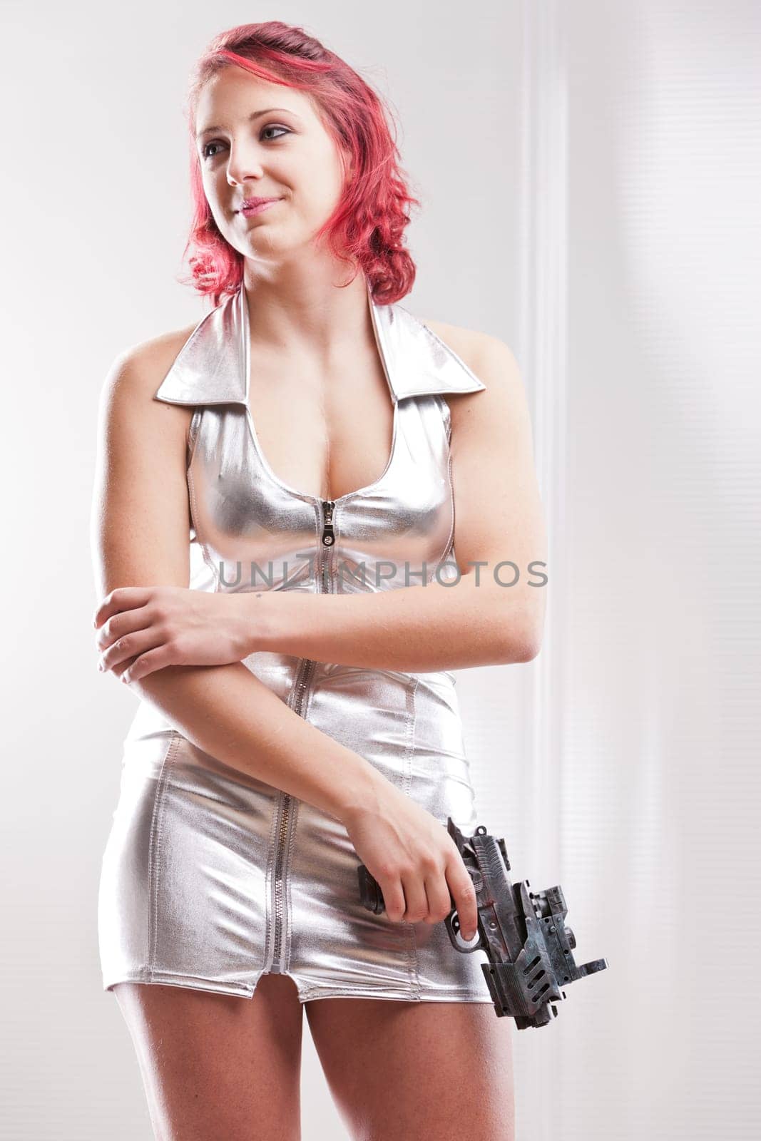 super hero space vintage costume girl waiting with a futuristic gun
