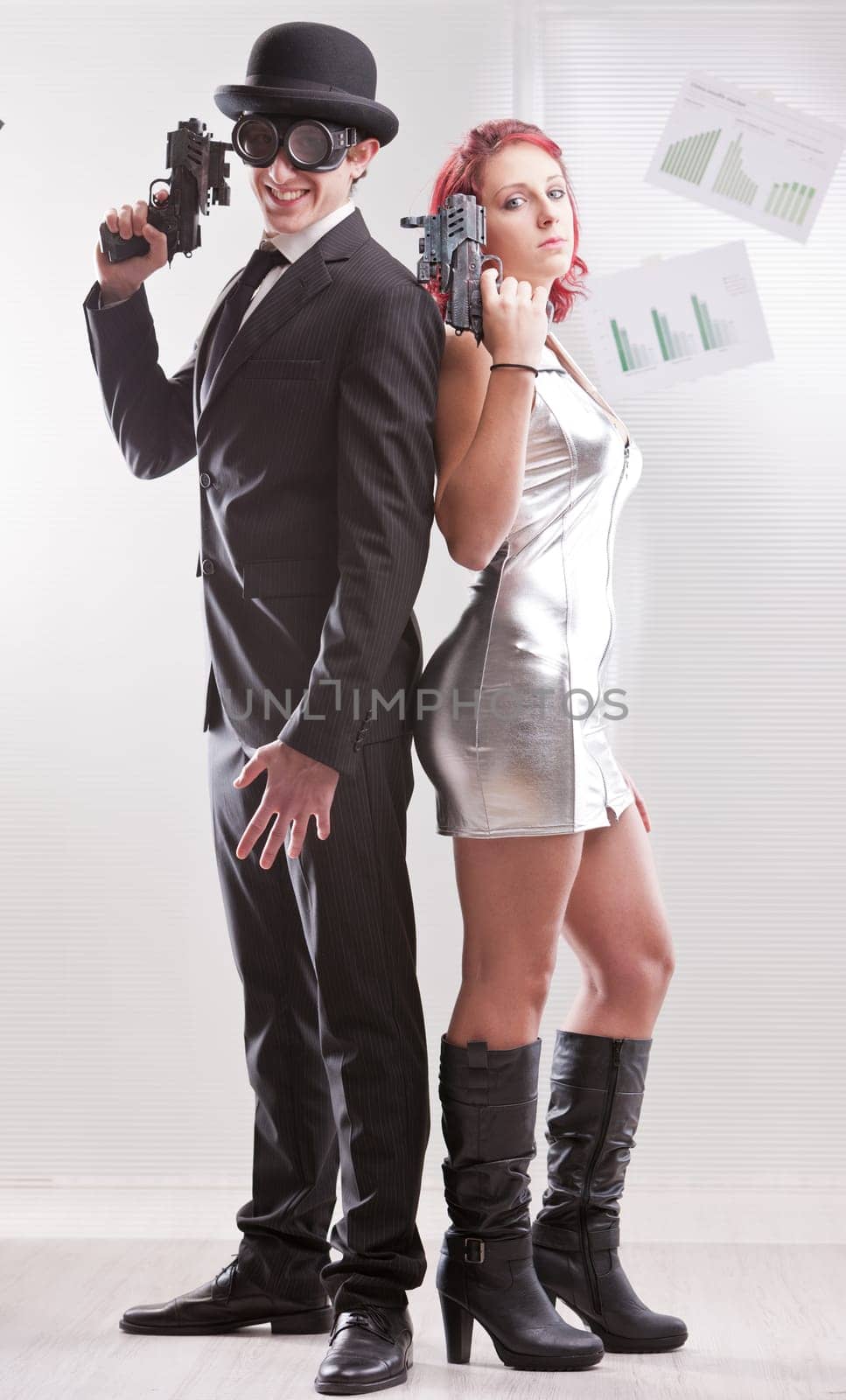 a weird couple of strange business superheroes in which she loves and hates him and they are attracted and the have to kill each other