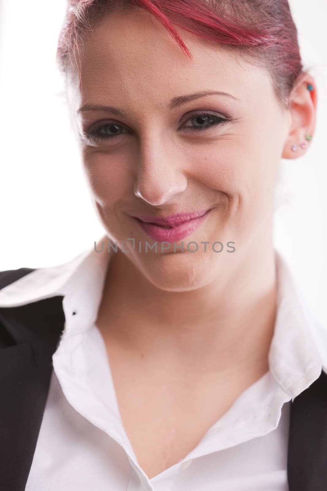 beautiful redhaired office girl worker smiling or laughing