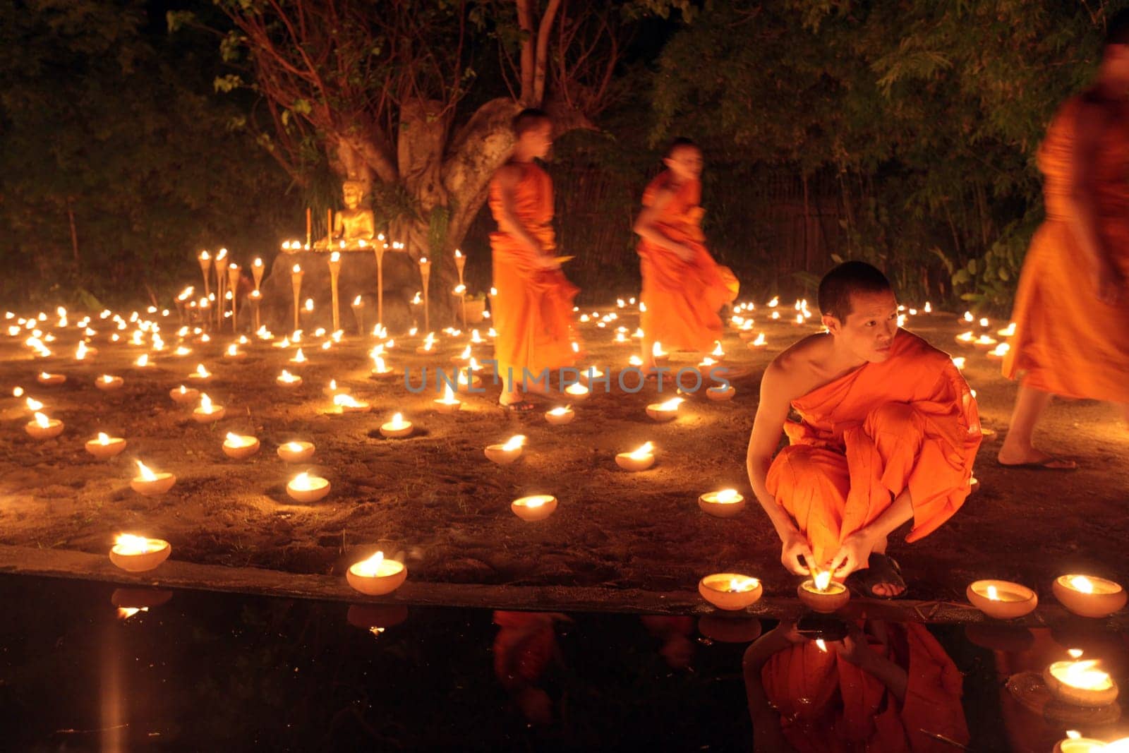 a buddhism ceremony at the Wat Phan Tao Temple in the city of chiang mai in the north of Thailand in Southeastasia. ...
