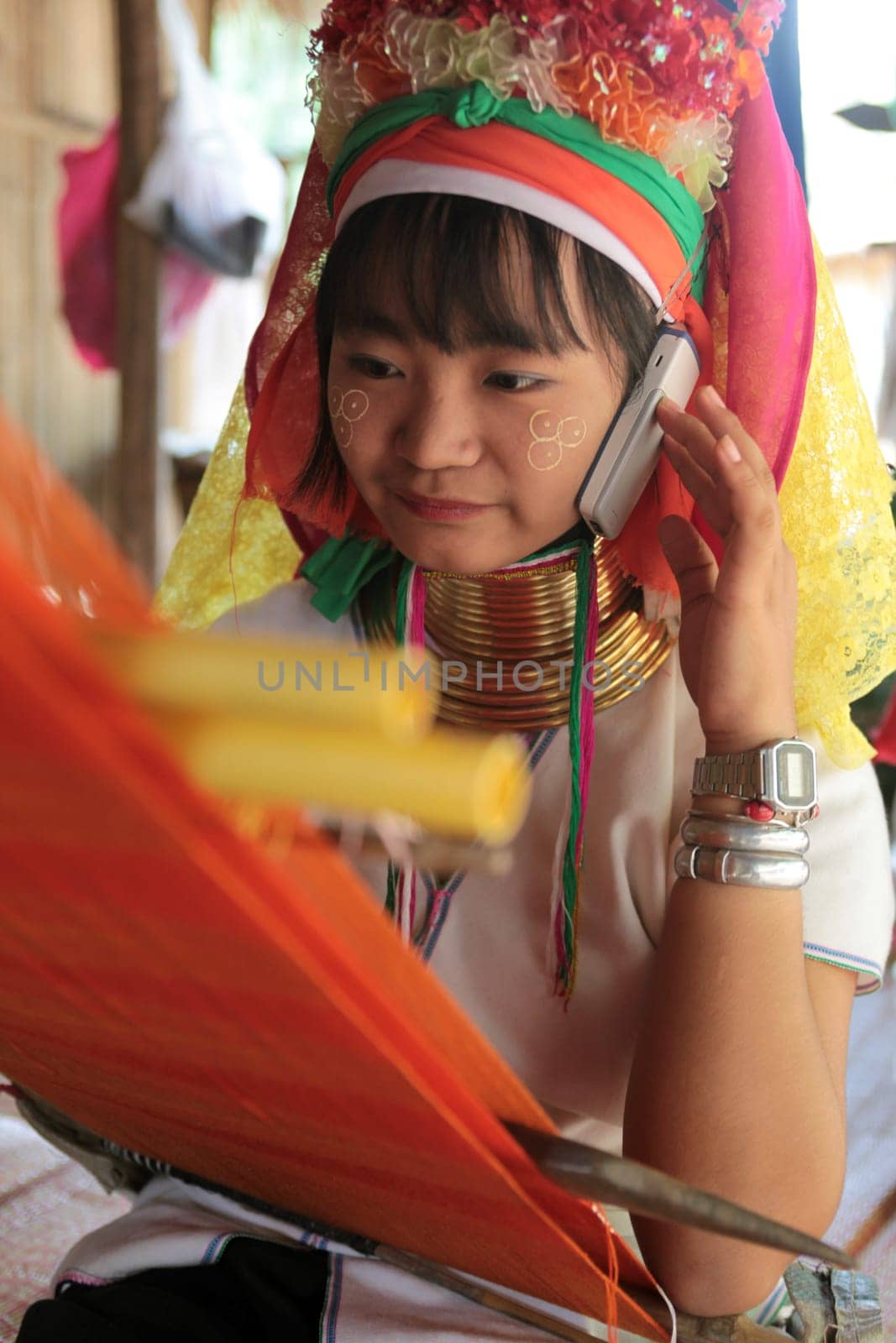 a traditional longneck women of the Paudang minority from Burma in a village north of chiang mai in the north of Thailand in Southeastasia. ...