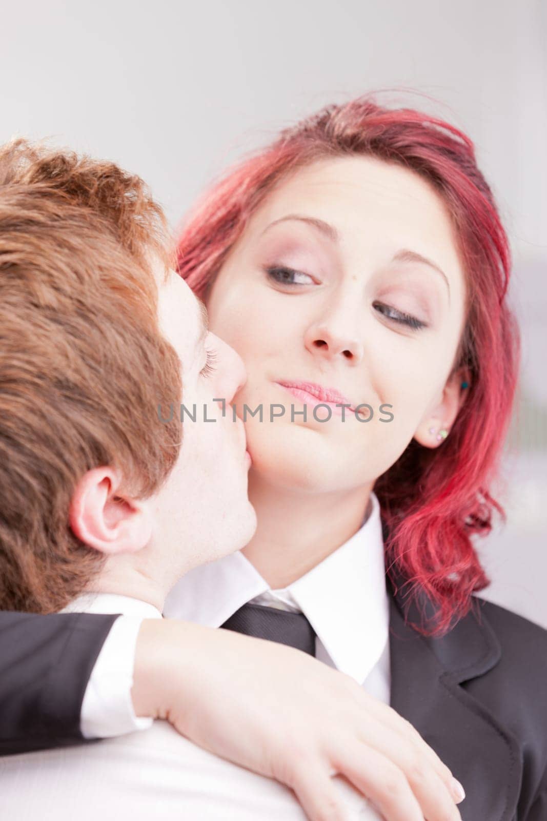 red headed clerks loving each other and embracing