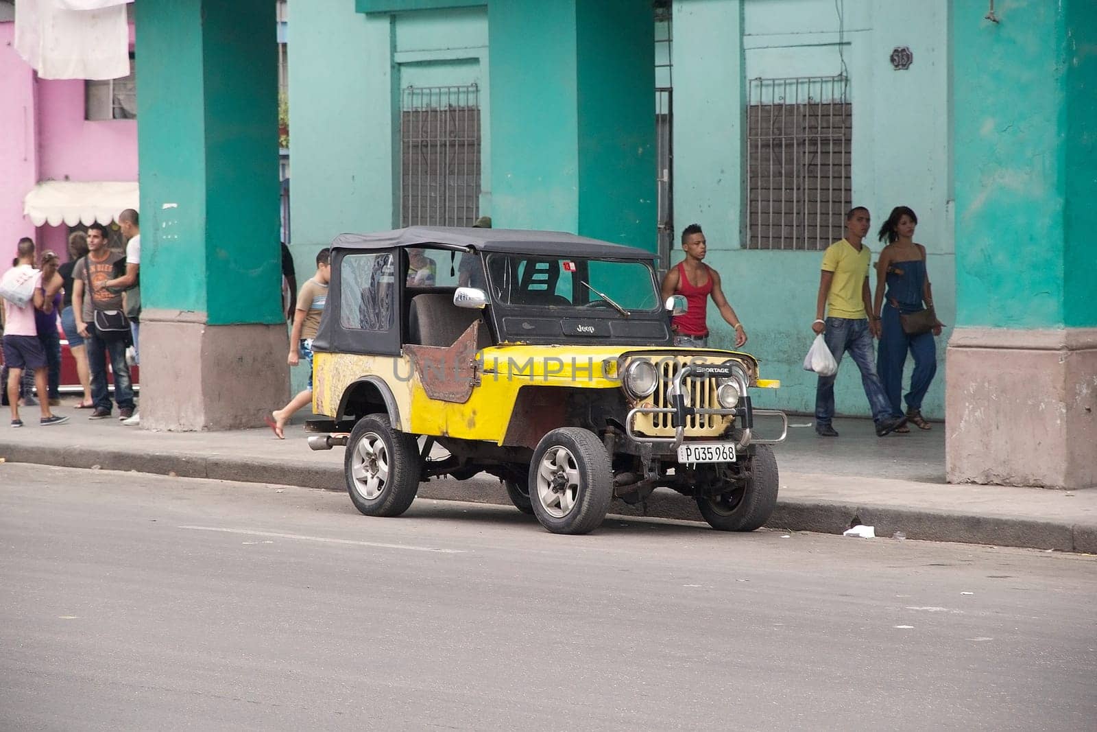 the old classic american car along the street at the Old Havana