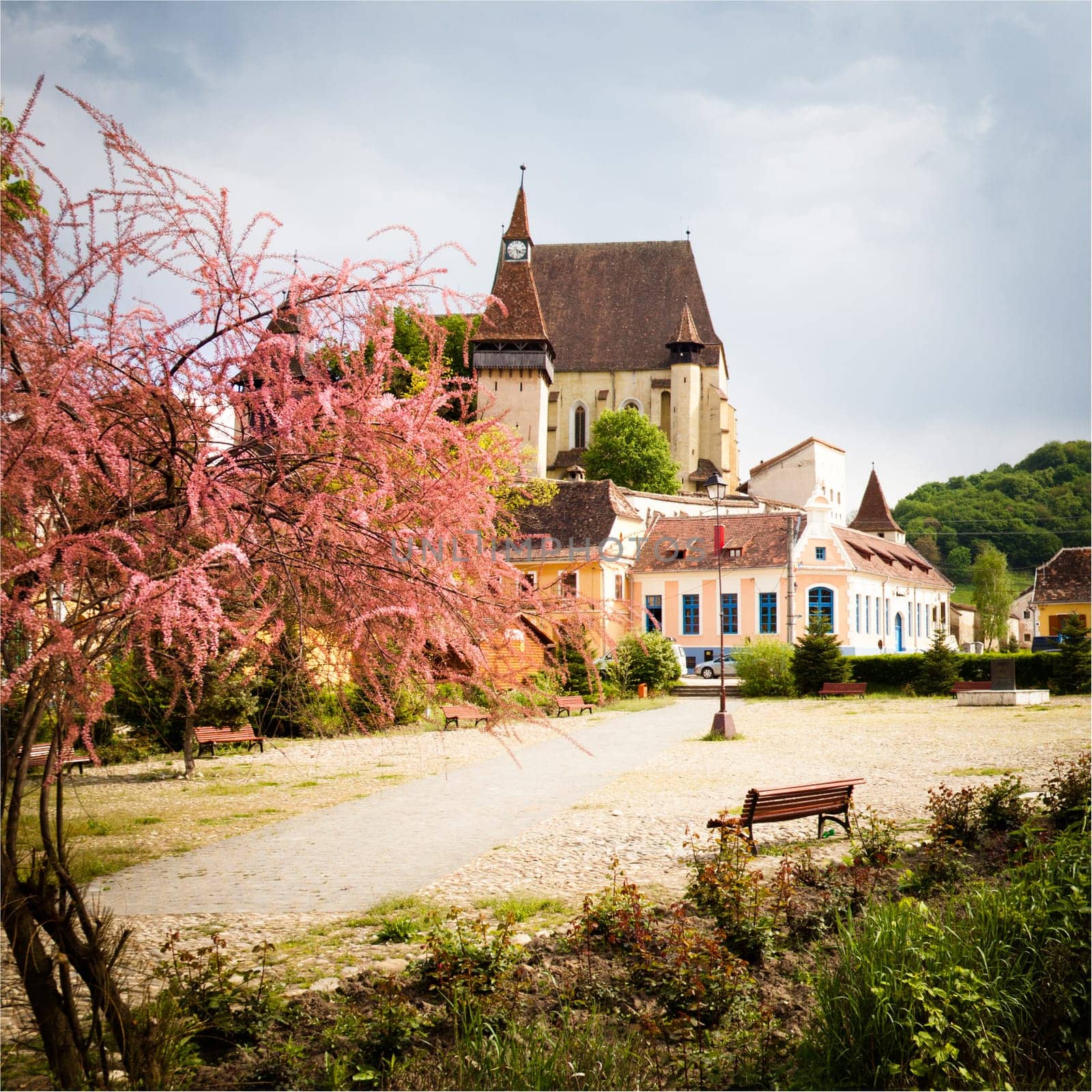 Street view of medieval Saxon village of Biertan with fortified church  in Romania .In Transylvania region