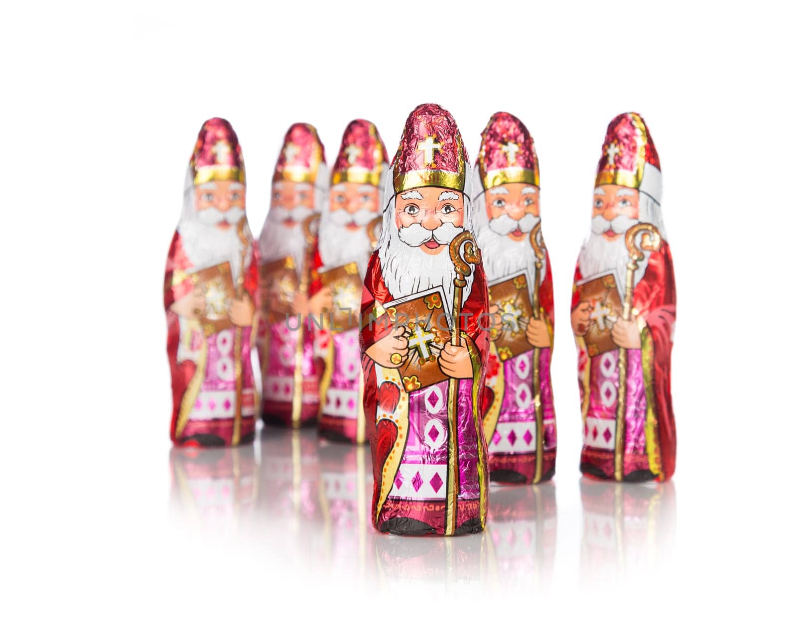 Close up of Sinterklaas. Saint  Nicholas chocolate figure of  Dutch character of Santa Claus.Isolated on white background.