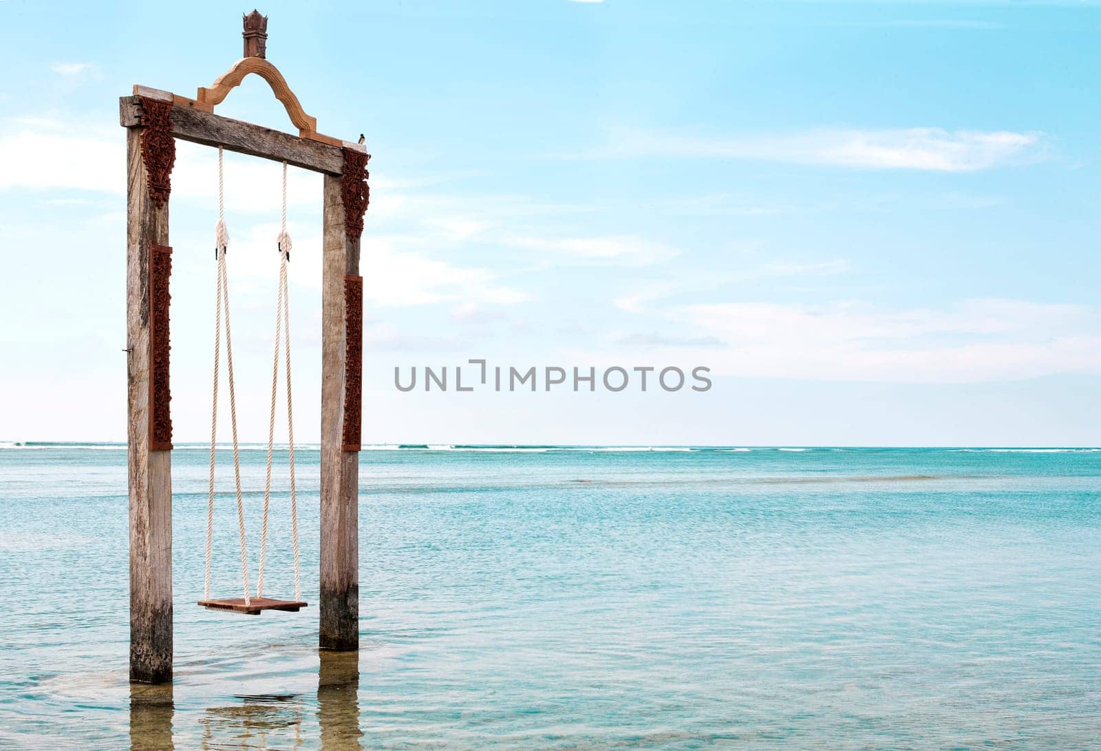 Swing in the sea - stock image