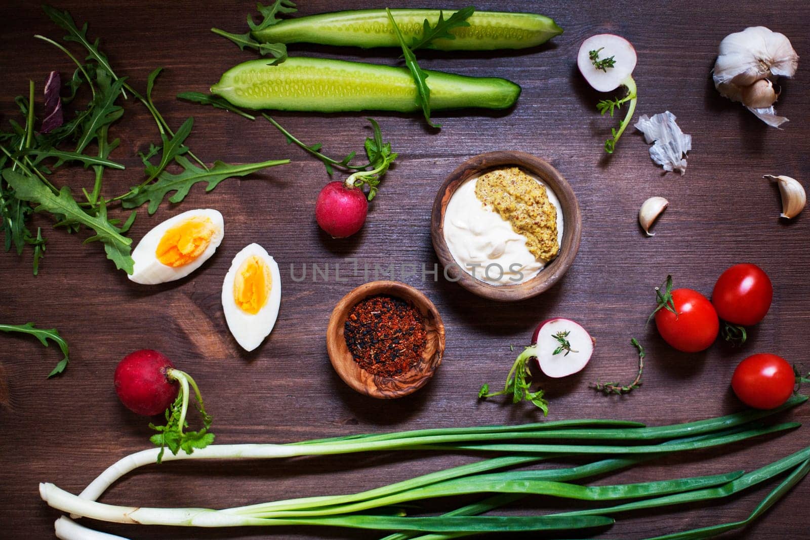 Vegetables over rustic table - Stock image