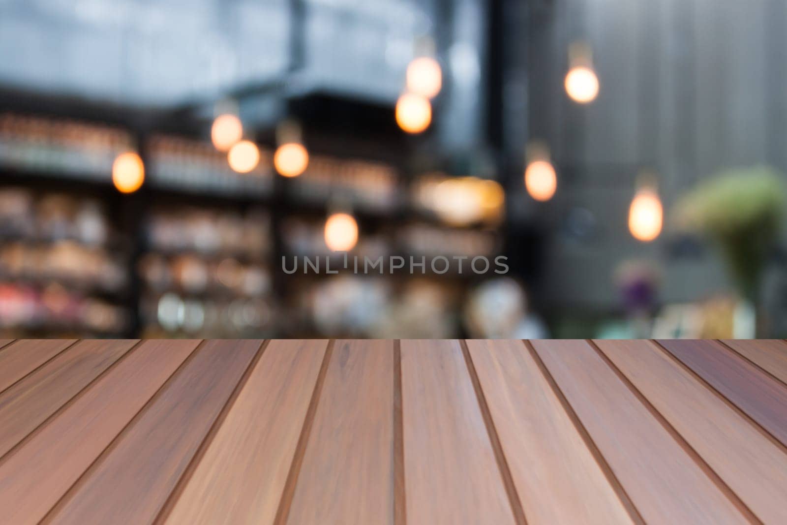 Brown luxury top wooden with blurred cafe background. product display template