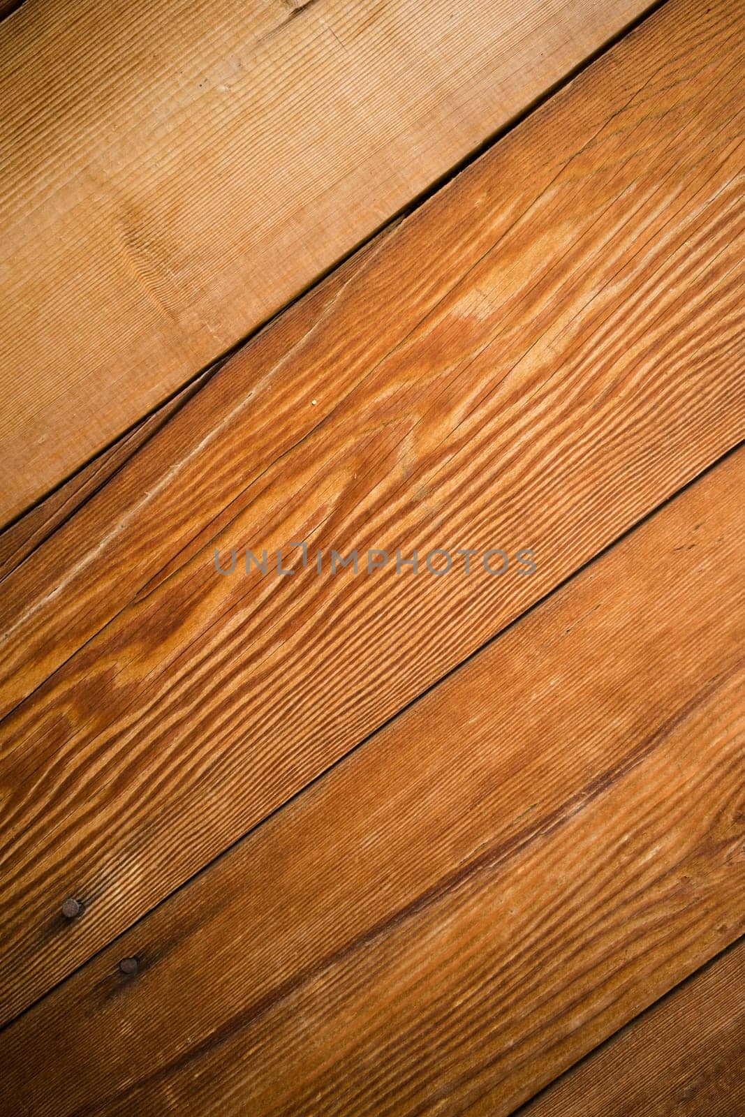 Looking at wood grain barn wall planks nails no knots