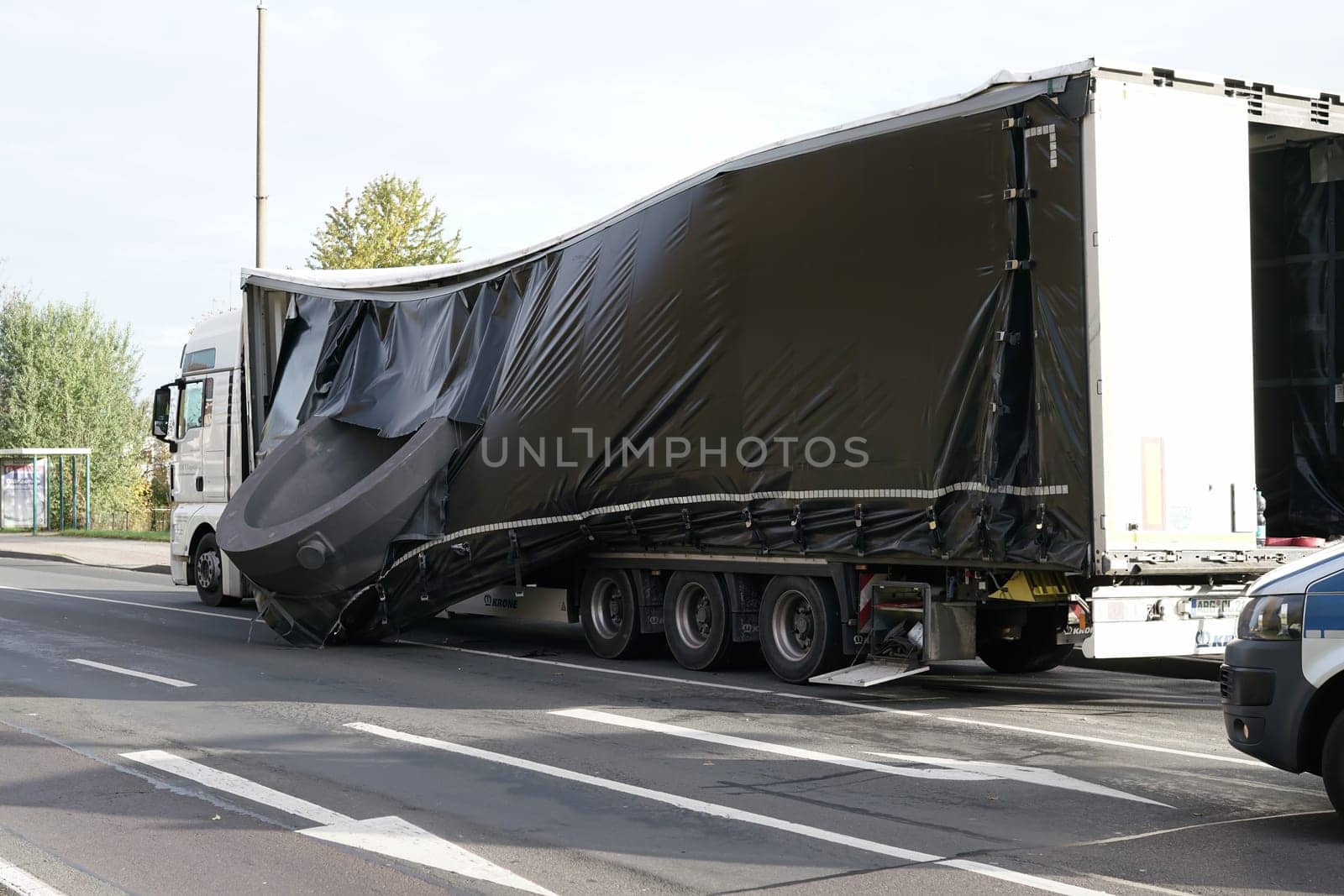 Accident of a heavy-duty transporter in the city center of Magdeburg. The cargo slipped and crashed onto the road