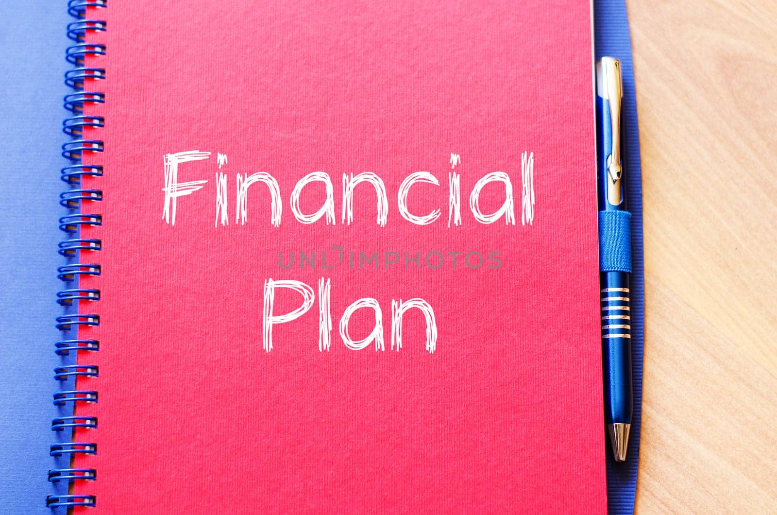 Financial plan text concept write on notebook