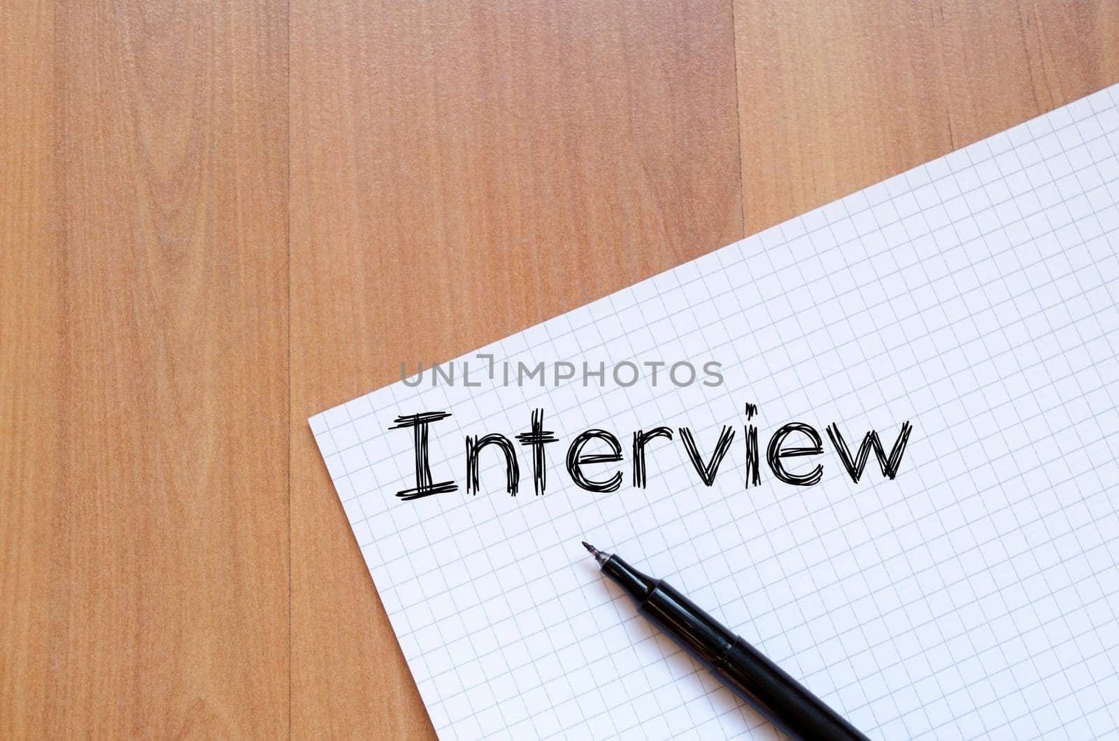 Interview text concept write on notebook