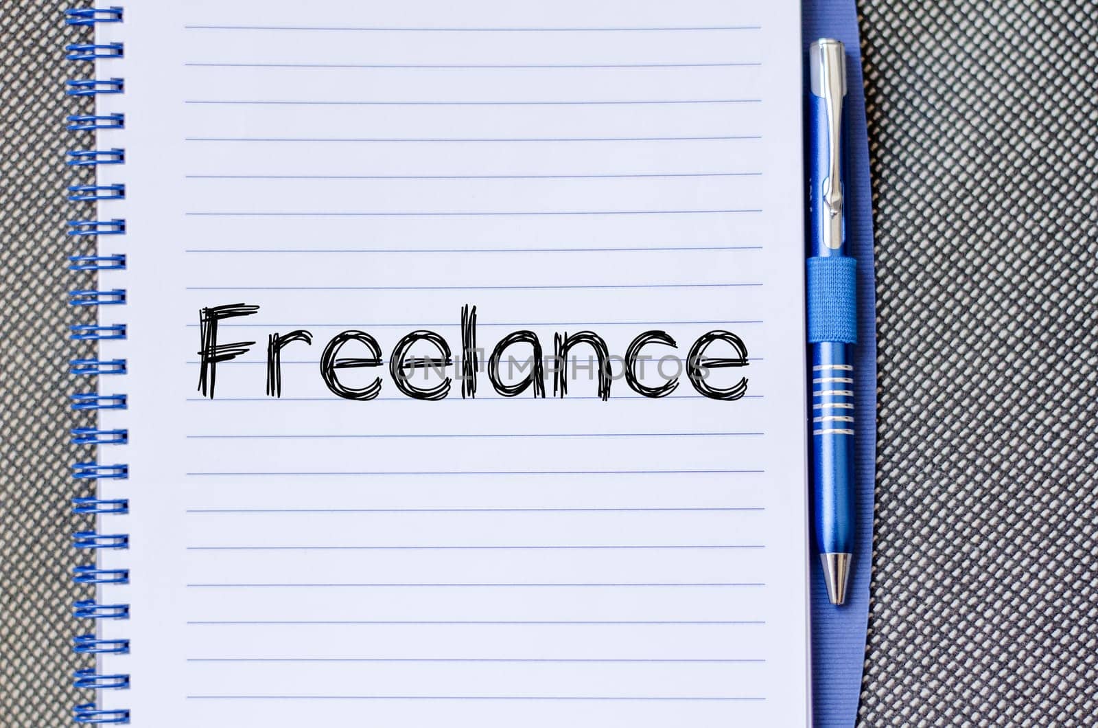 Freelance text concept write on notebook