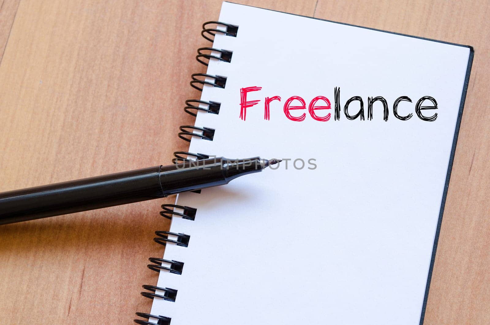 Freelance text concept write on notebook